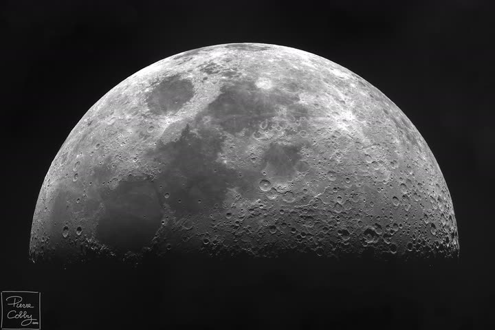 Half Moon showing craters and lunar seas in fine detail