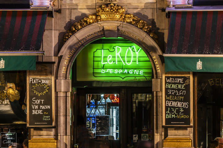 Le Roy d’Espagne café with its green neon sign on the Grand-Place, Brussels